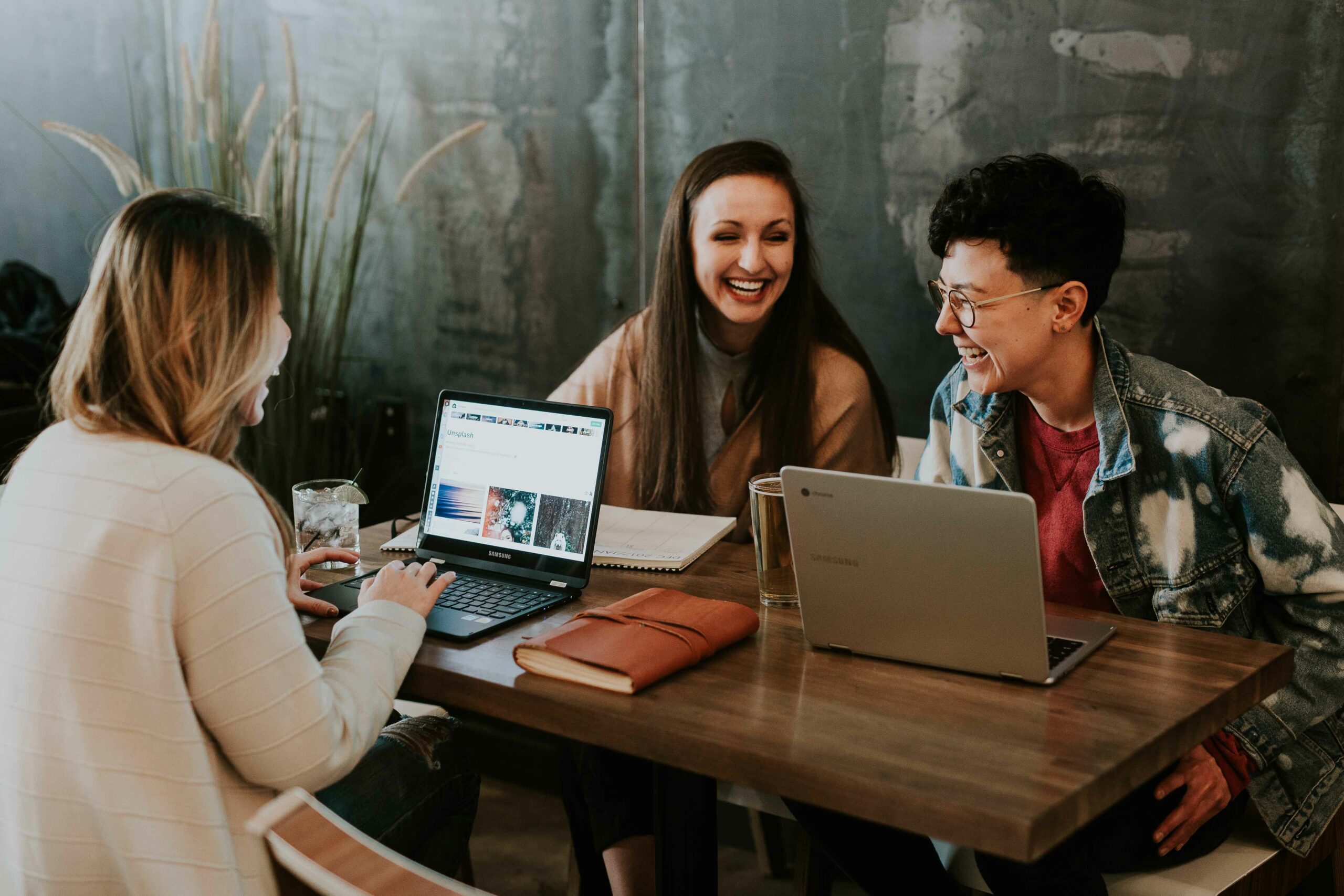 stock image of young people working and laughing